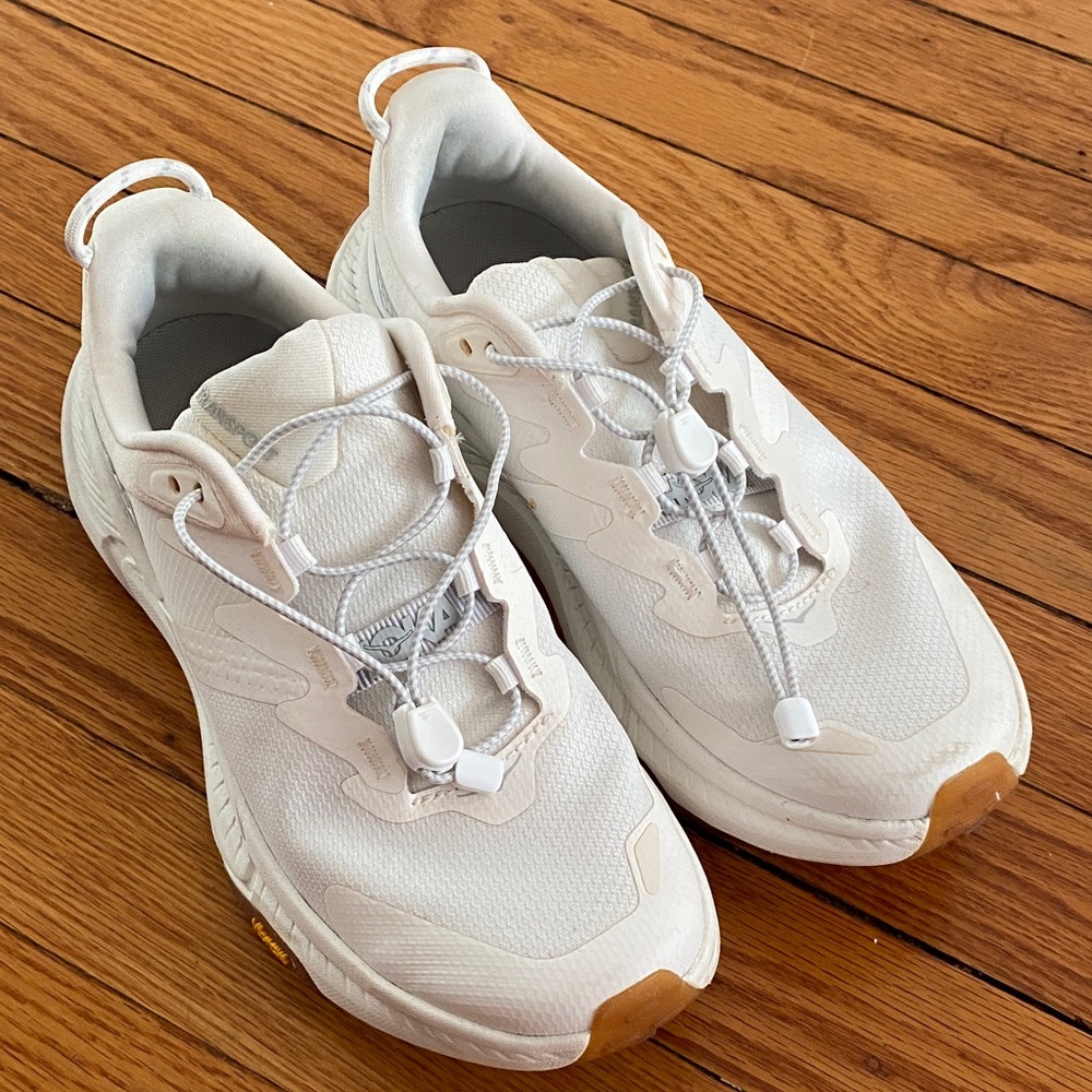 White HOKA transport sneakers size 6.5